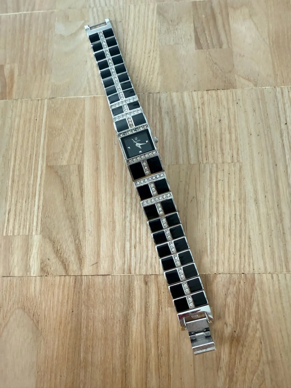 Bulova ladies rectangular silver tone crystal accented watch NEW BATTERY